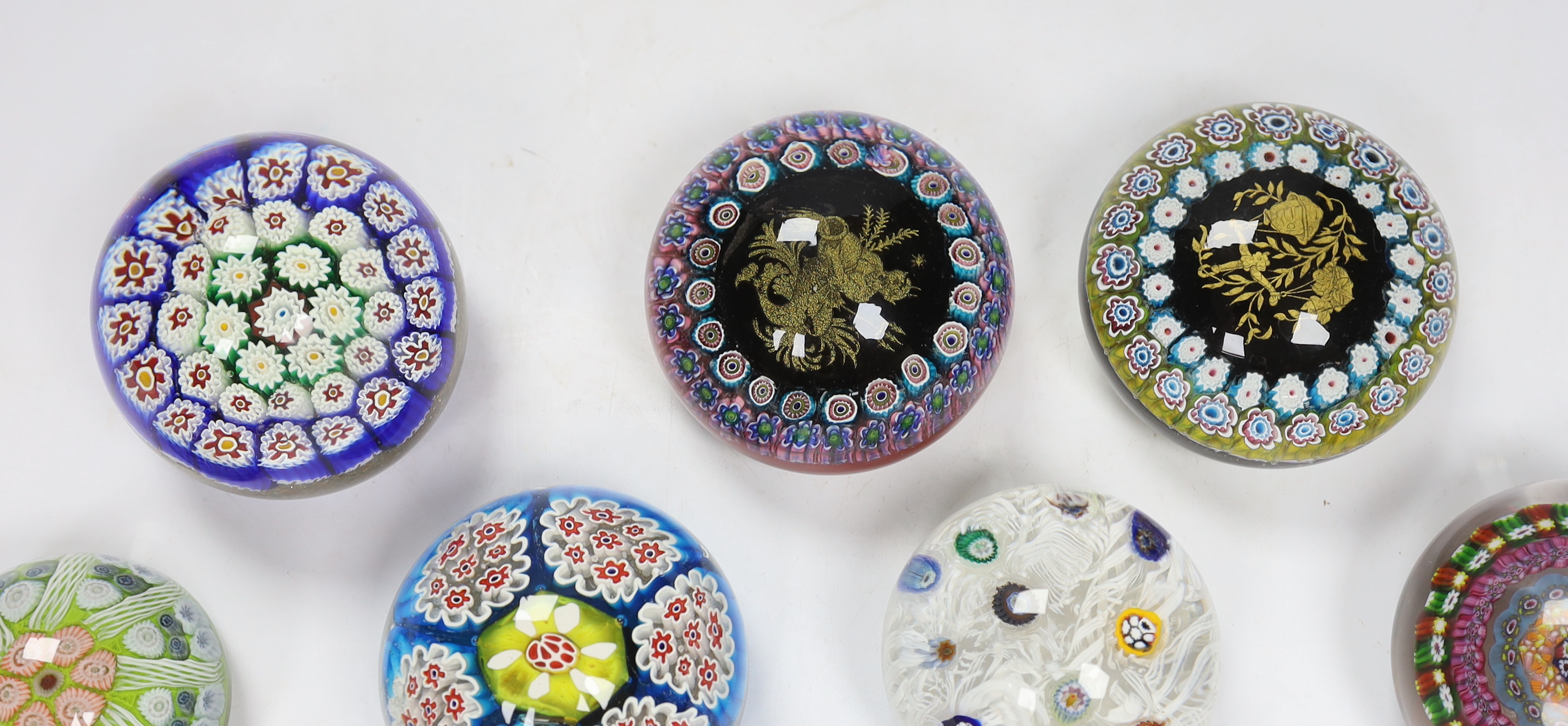 Seven various glass millefiori paperweights, Murano etc.